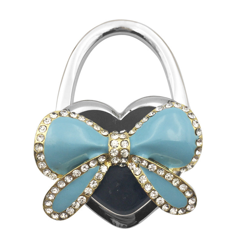 Wholesale Bow Hanging Creative and Practical Girl Bag Hook Folding Bag Hook At The Table